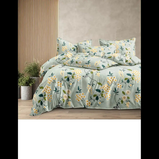 Light green floral cotton bedsheet set with yellow and white flowers, 310 TC, fitted design, including matching pillowcases.