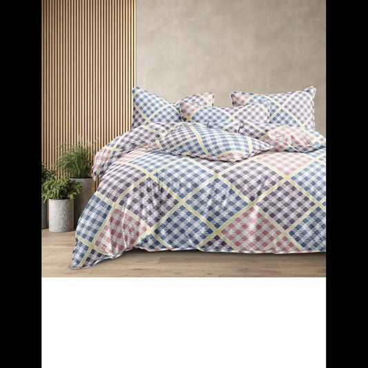 Pastel geometric cotton bedsheet in shades of blue, pink, and cream, 310 TC, fitted design, including matching pillowcases.